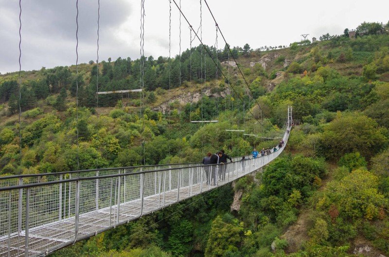 Tourists visit Khndzoresk Bridge Armenia