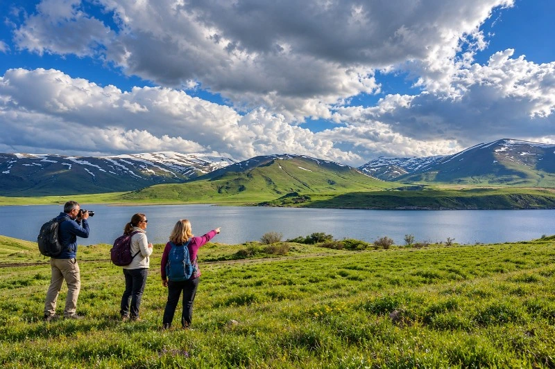 Tourists enjoying Armenia's mountain scenery.